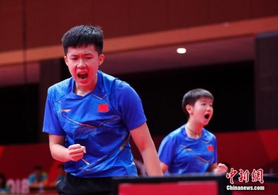 資料圖：雅加達(dá)亞運(yùn)會(huì)，王楚欽/孫穎莎奪得混雙冠軍。 <a target='_blank' href='/'>中新社</a>記者 劉關(guān)關(guān) 攝