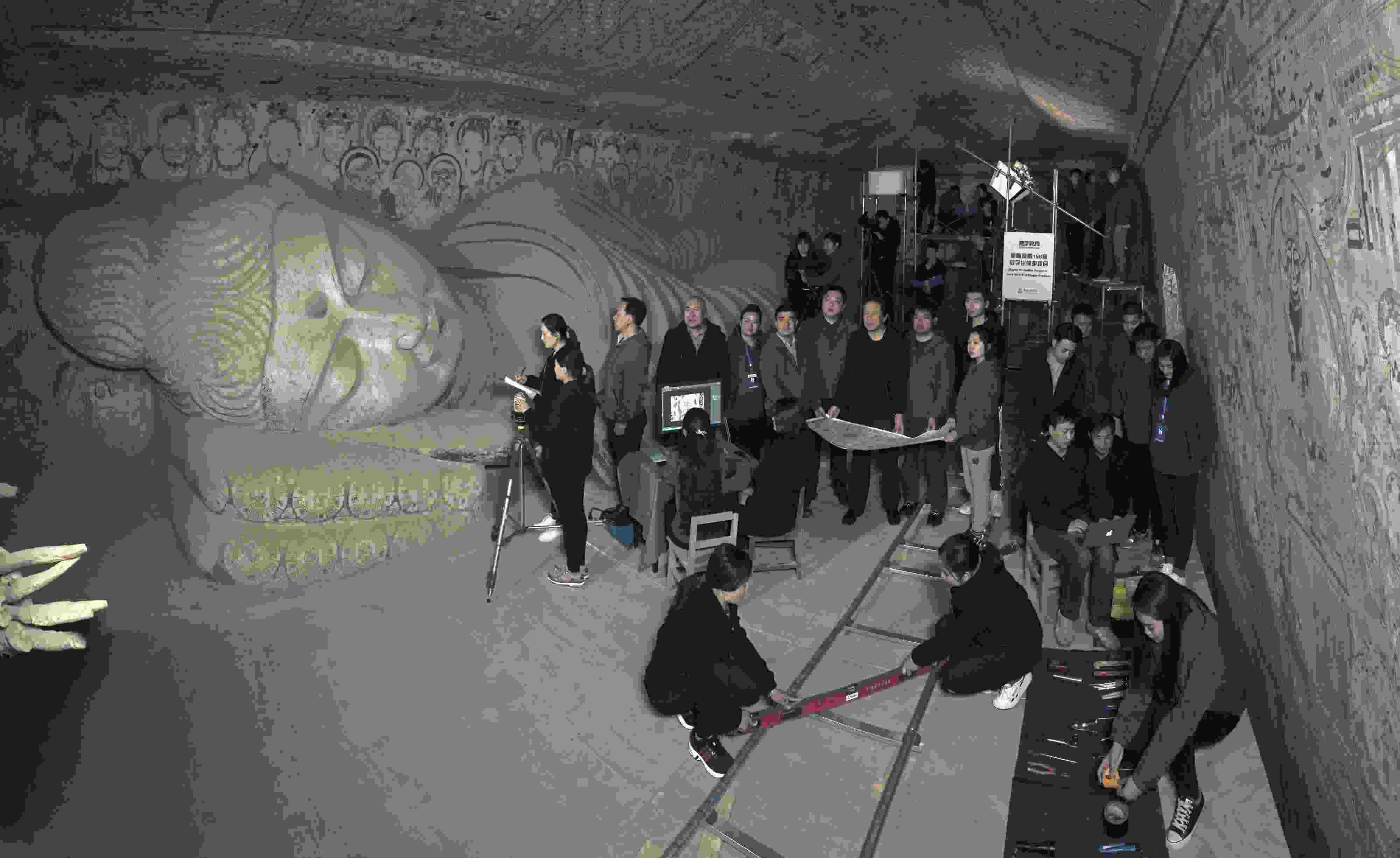 敦煌研究院文物數(shù)字化團隊在莫高窟第158窟工作現(xiàn)場。敦煌研究院供圖