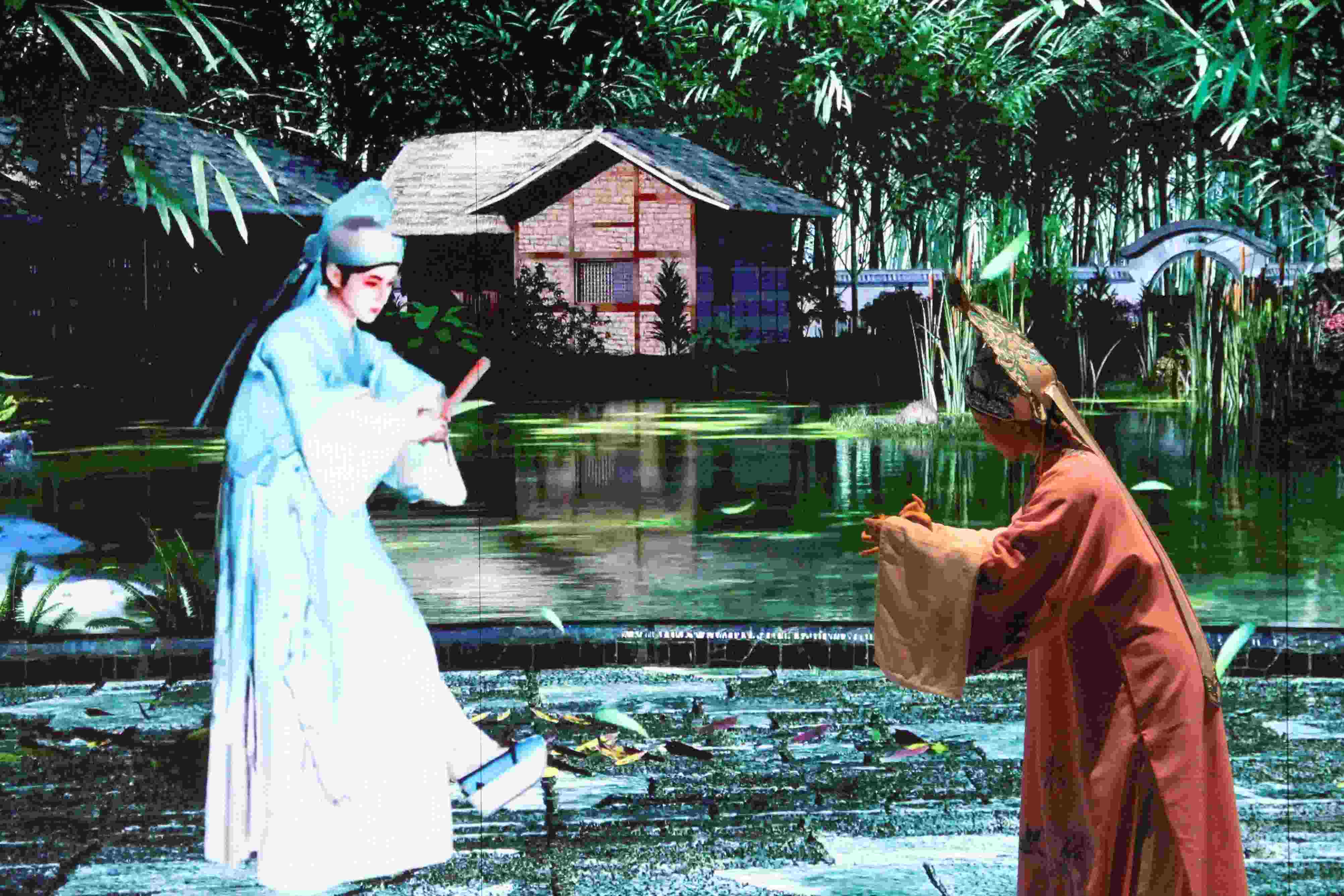 真人演員與虛擬人演員在“元啟金陵”南京數(shù)字文化客廳出演《梁山伯與祝英臺(tái)》經(jīng)典選段。受訪者供圖