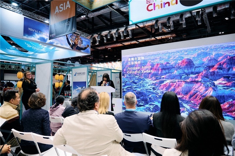  “中國館”新疆旅游推介會現(xiàn)場介紹。楊浩鵬攝